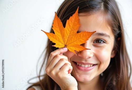 Autumn mood, happy smiling girl closes her eye with fall maple leaf, isolated on white background, promo poster template for seasonal autumn marketing, sale