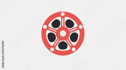 A stylized red and black circular film reel sits centered on a gray background