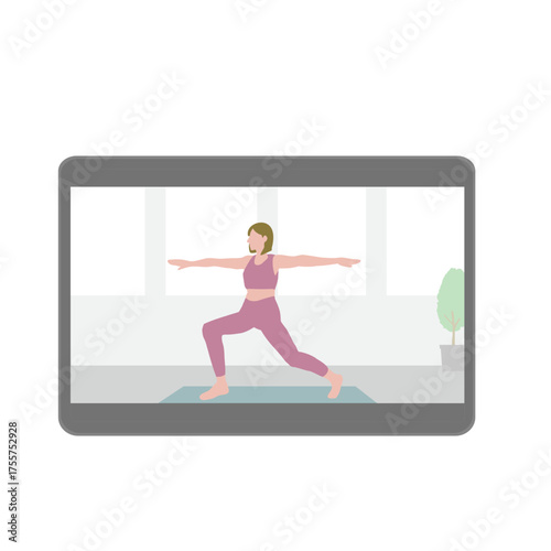ヨガの動画が映されているタブレット