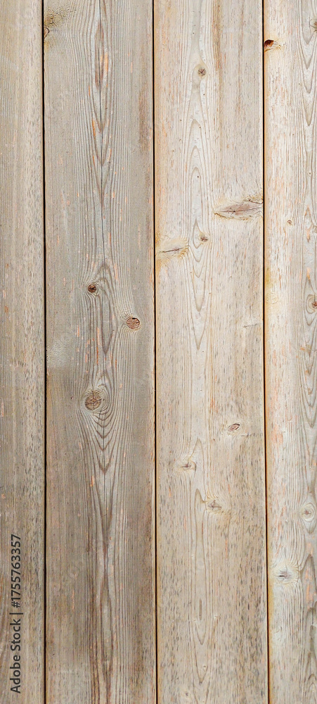 Naklejka premium Texture of vertical planks in a close-up shot
