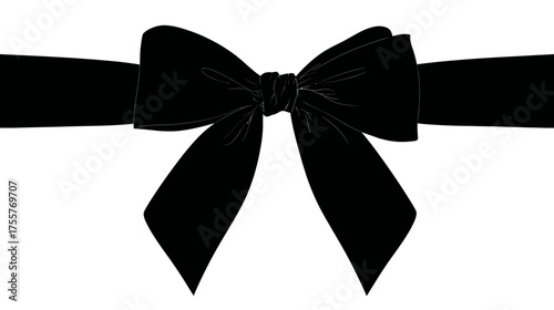 A black ribbon tied into a bow with dangling loops