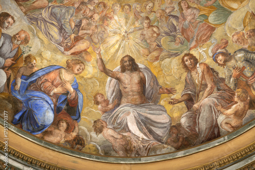 SALERNO, ITALY - OCTOBER 6, 2025: The detail of baroque fresco of “Paradiso Salernitano” -  Glory of Holy Trinity among the saints in the church Chiesa di San Giorgio by Angelo Solimena (1674‑1675)
