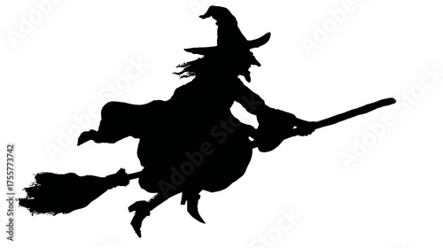 A black silhouette of a witch flying on a broomstick