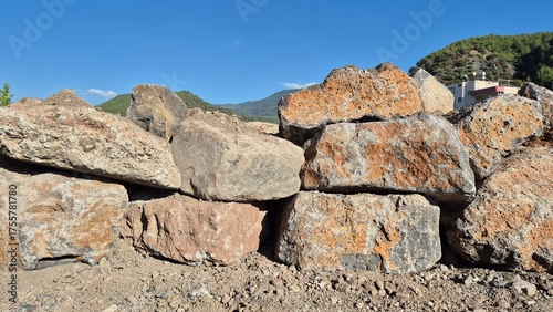 Photos large stones forming a rustic retaining wall
