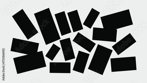 A collection of black rectangles scattered across a white background in a random arrangement pattern