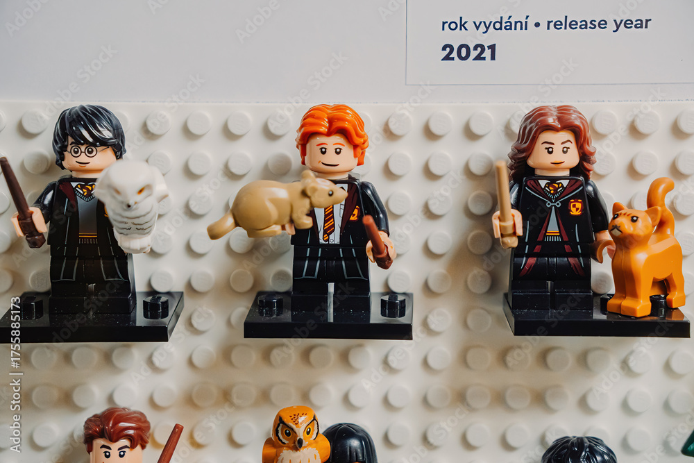 Naklejka premium Prague, Czechia - September 20, 2025: LEGO Harry Potter minifigures of Ron Weasley and Hermione Granger