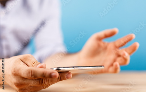 Close-up of a man's hands h...