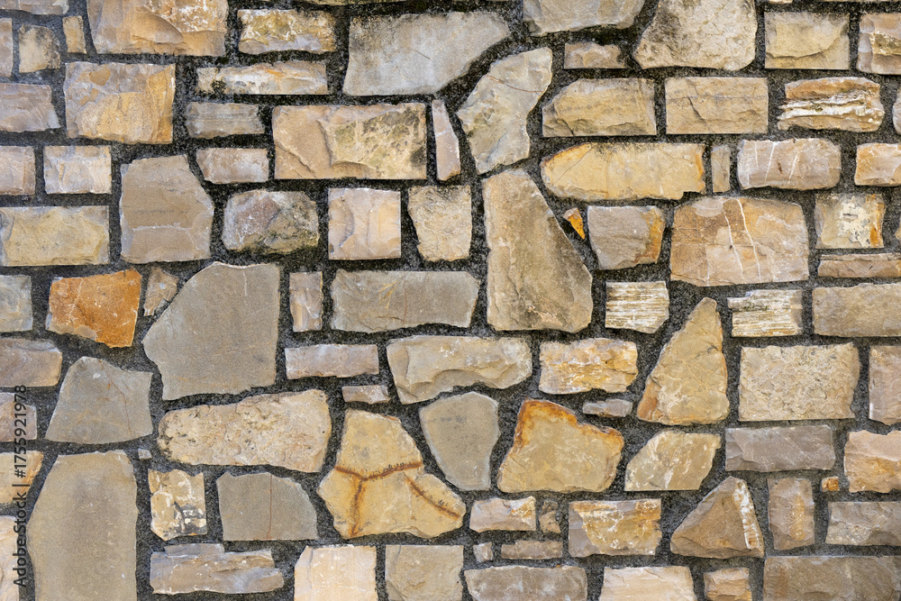 Fototapeta premium Wall made of stone and bricks