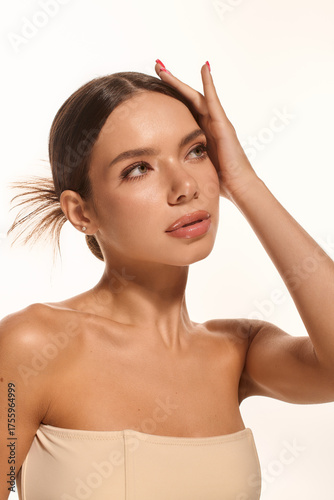 Wallpaper Mural Beautiful young woman showcasing natural beauty against a soft white background Torontodigital.ca