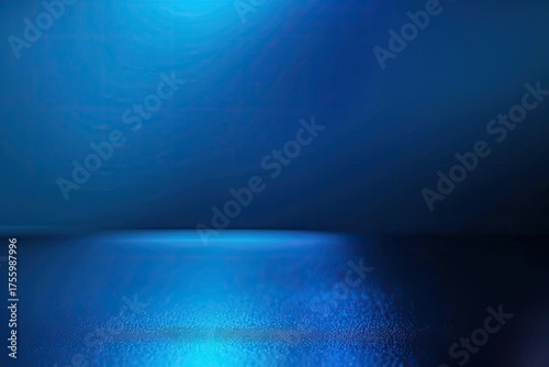 Blue lit studio floor reflecting light used for product presentation or design