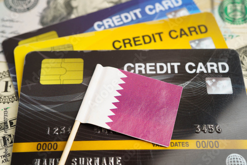 Wallpaper Mural Qatar flag on credit card, finance economy trading shopping online business. Torontodigital.ca