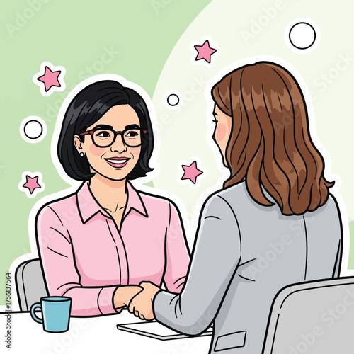  Two women shaking hands during a positive business meeting