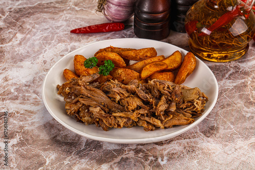 Baked shredded pork with potato