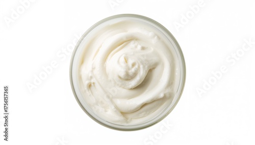 Glass cup filled with a cre...