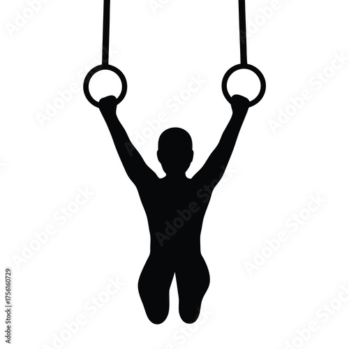 Silhouette of a gymnast performing a ring hold on gymnastic rings