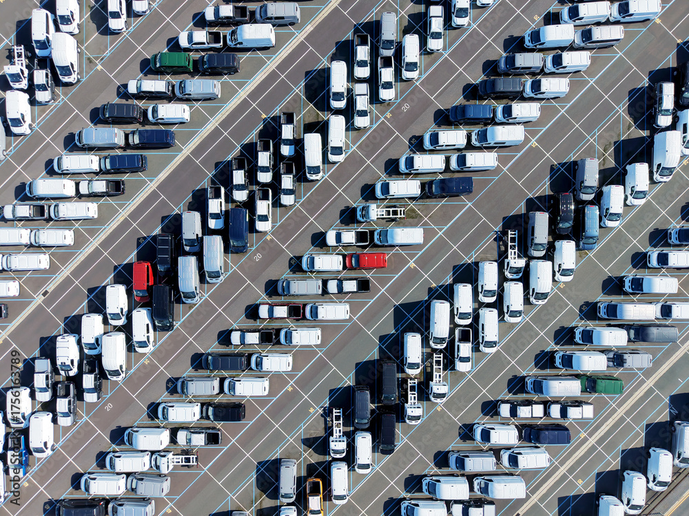 Fototapeta premium Car parking at the port. Delivery of cars by ship. Cars background. Car parking.