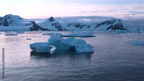 Stunning views of melting ice in the Arctic showcase the effects of climate change and global warming. The changing landscape highlights the urgency of environmental awareness.