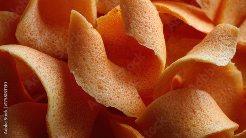 Orange peel citrus peel texture close up macro orange color curved peel rind porous surface food fresh citrus fruit vitamin c spiral zest peel curl natural detail background pattern organic