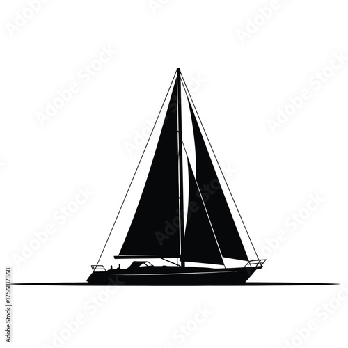 A sleek sailboat gracefully gliding across the water a striking silhouette