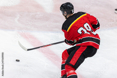 Ice hockey players playing ice hockey