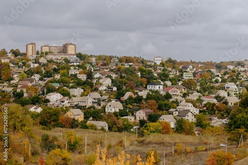Family Walking With Pet Golden Retriever Dog Along Autumn Woodland Path Together