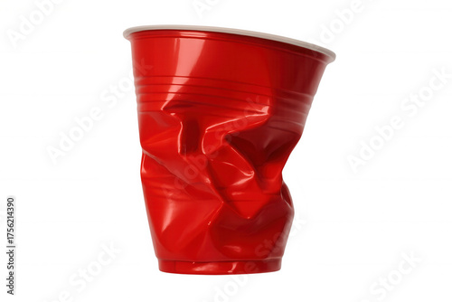 Red crumpled plastic cup showing single-use waste, party aftermath, disposable pollution, and recycling concept