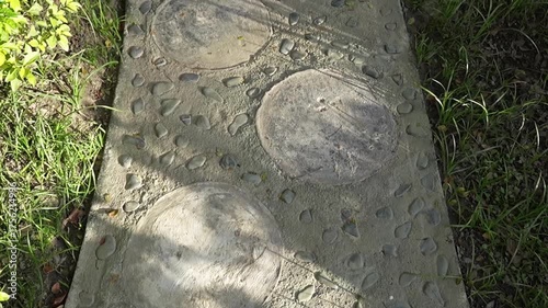 Advancing on a stone path in a garden