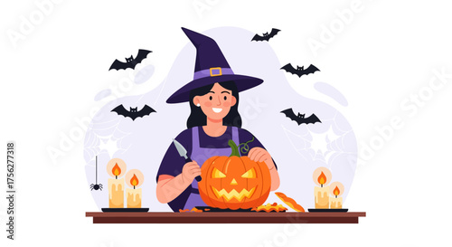 Woman carving a pumpkin for Halloween celebration with candles and bats.