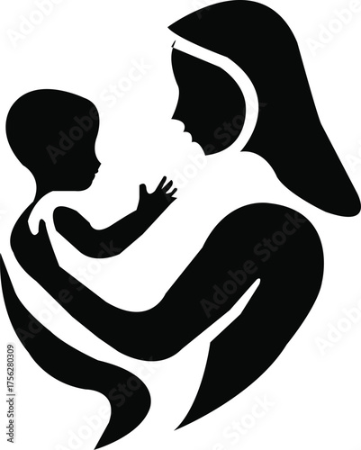 Silhouette of mother holding baby in arms