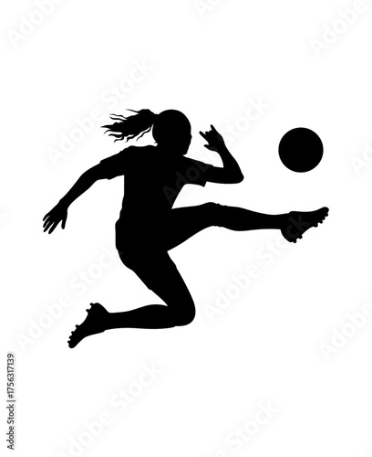 Dynamic silhouette of a female soccer player kicking a ball in mid air during a game