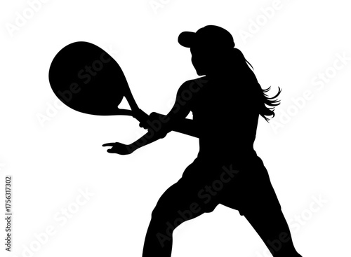 Silhouette of a female tennis player in action hitting a forehand shot with a racket