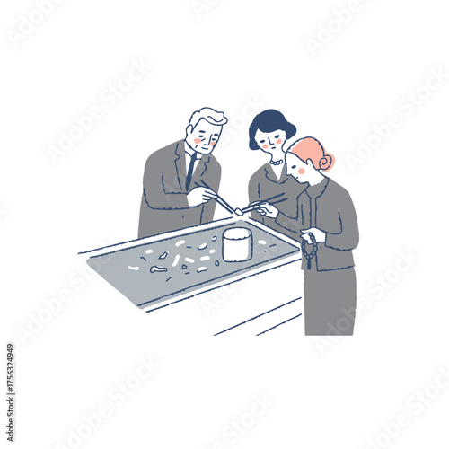 火葬後に骨上げをしている遺族