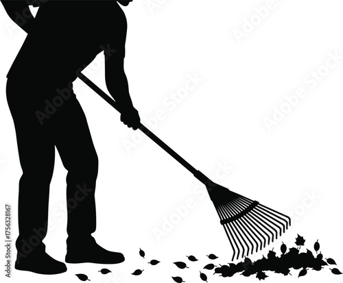 Autumn silhouette of person raking leaves with long rake, seasonal yard work, outdoor cleanup, fall maintenance, and gardening themes