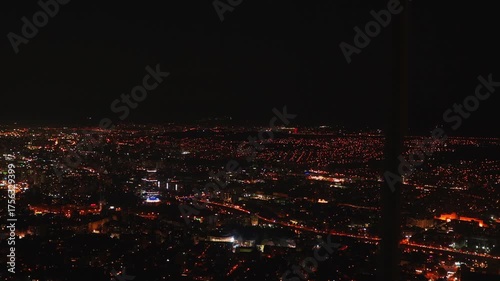 Night city glowing with energy and colorful lights, blending technology, urban planning, and atmospheric design into one seamless modern skyline