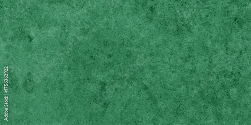 Abstract Elegant dark green background with mottled vintage texture in old fancy background design, texture of colored parchment paper.