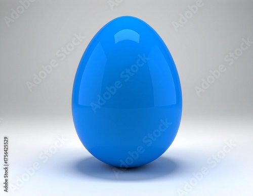A single, vibrant blue egg sits centered against a clean, gradient background, symbolizing new beginnings and simplicity.
