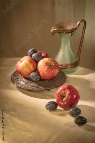 Beautiful background with apples and plums