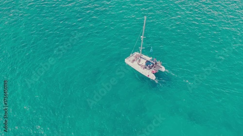 Aerial Drone Flight of Catamaran Boat in Caribbean Waters Isla Mujeres Mexico