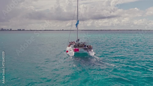 Aerial Drone Flight of Catamaran Boat in Caribbean Waters Isla Mujeres Mexico
