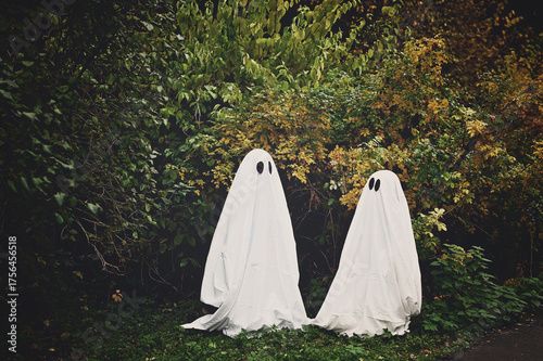 kids in ghost costumes