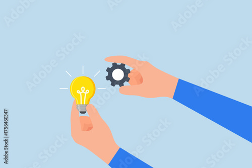 Implement business idea, entrepreneur grasping lightbulb concept integrating gear to bring it to life