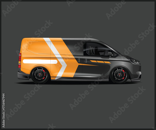 Modern cargo van with bold orange and gray graphic wrap and custom wheels