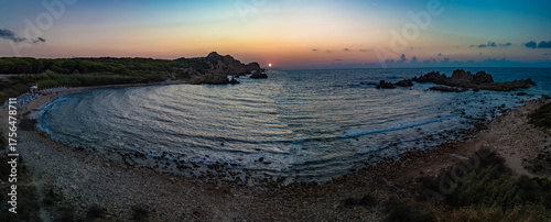 Beautiful sunset over the Canneddi Beach, Sassari, Sardinia, Italy