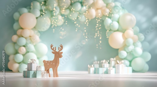 Whimsical pastel balloon arch with a cute wooden deer and gift boxes for a magical baby shower celebration