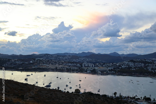 Aerial view of boats waiting in the bay during an autumn sunset in the famous holiday resort of Bodrum.	
