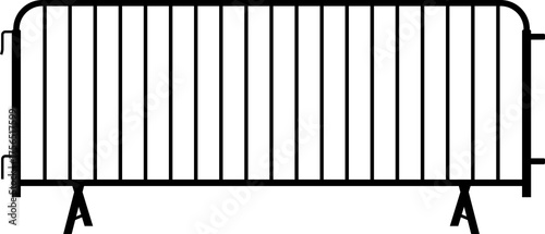 Foto Silhouette of a metal crowd control barrier.