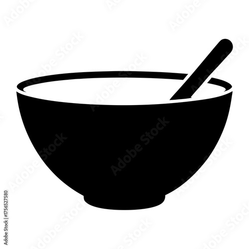 Black and white bowl filled with food and a spoon inside
