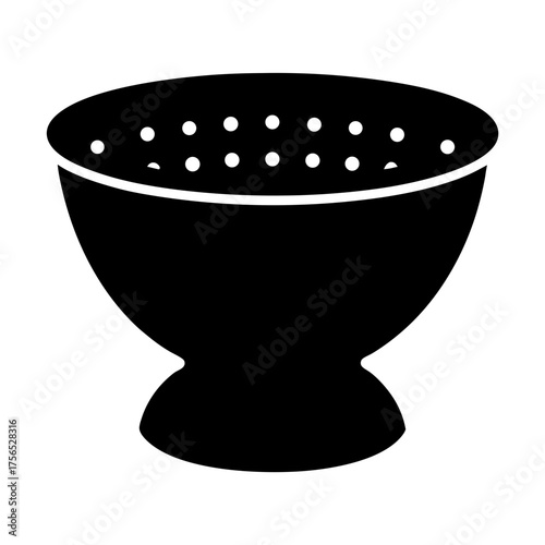 Black and white image of a kitchen colander with drainage holes