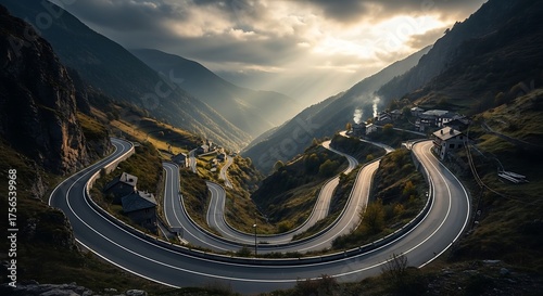 Serpentine Mountain Road Carved Through Dramatic Valley Scenery Under a Cloudy Sky