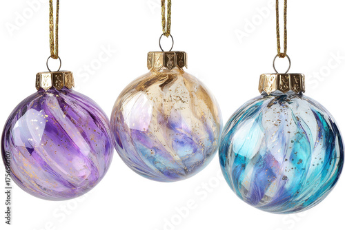 Three colorful Christmas ornaments with gold string hanging decorations for holiday season isolated on white background